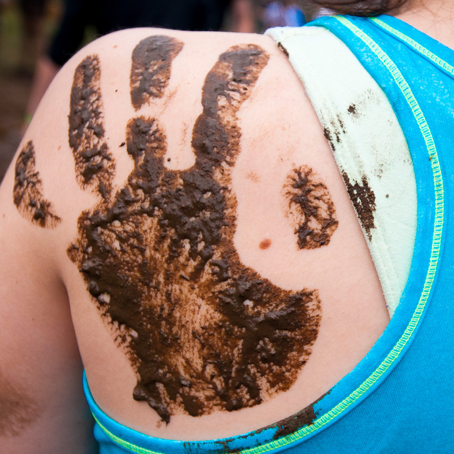 muddy handprint on shoulder